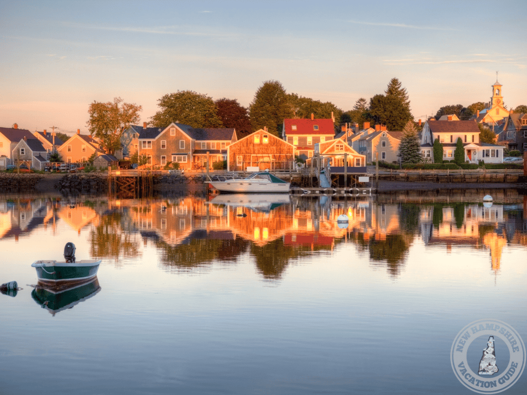 Portsmouth NH harbor with houses reflected in water of the harbor