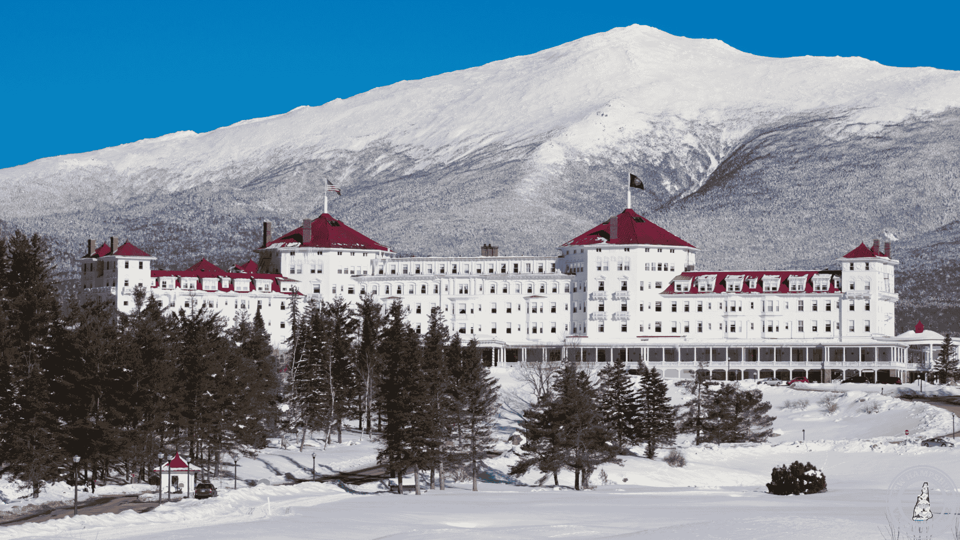 The Mount Washington Hotel Resort with Mt Washington in background covered with snow